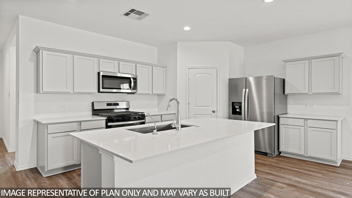 open concept living and dining area with vinyl flooring, quartz countertopd, and large windows