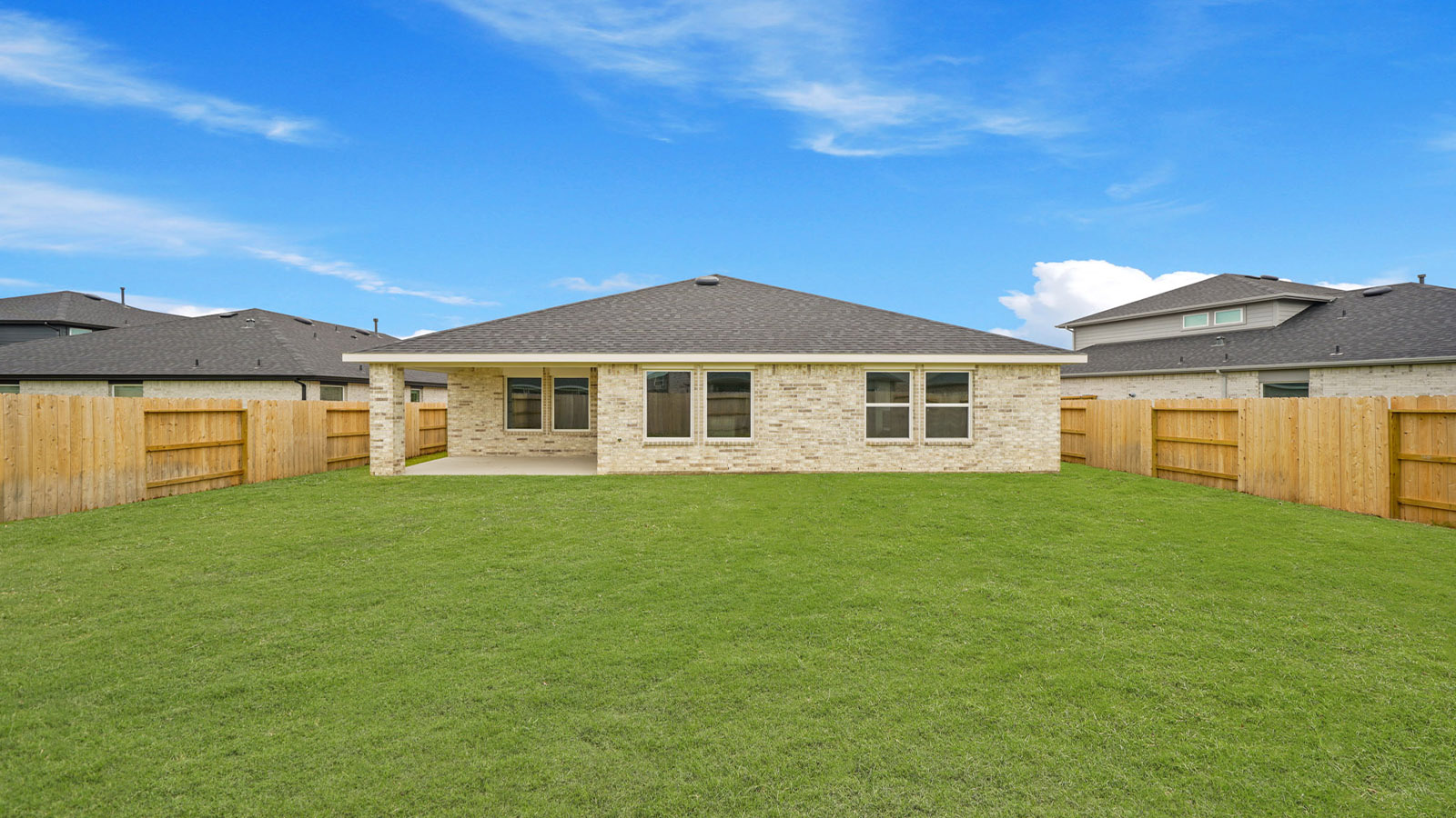 New House by D.R. Horton featuring paved patio for outdoor entertaining and backyard space ideal for gatherings