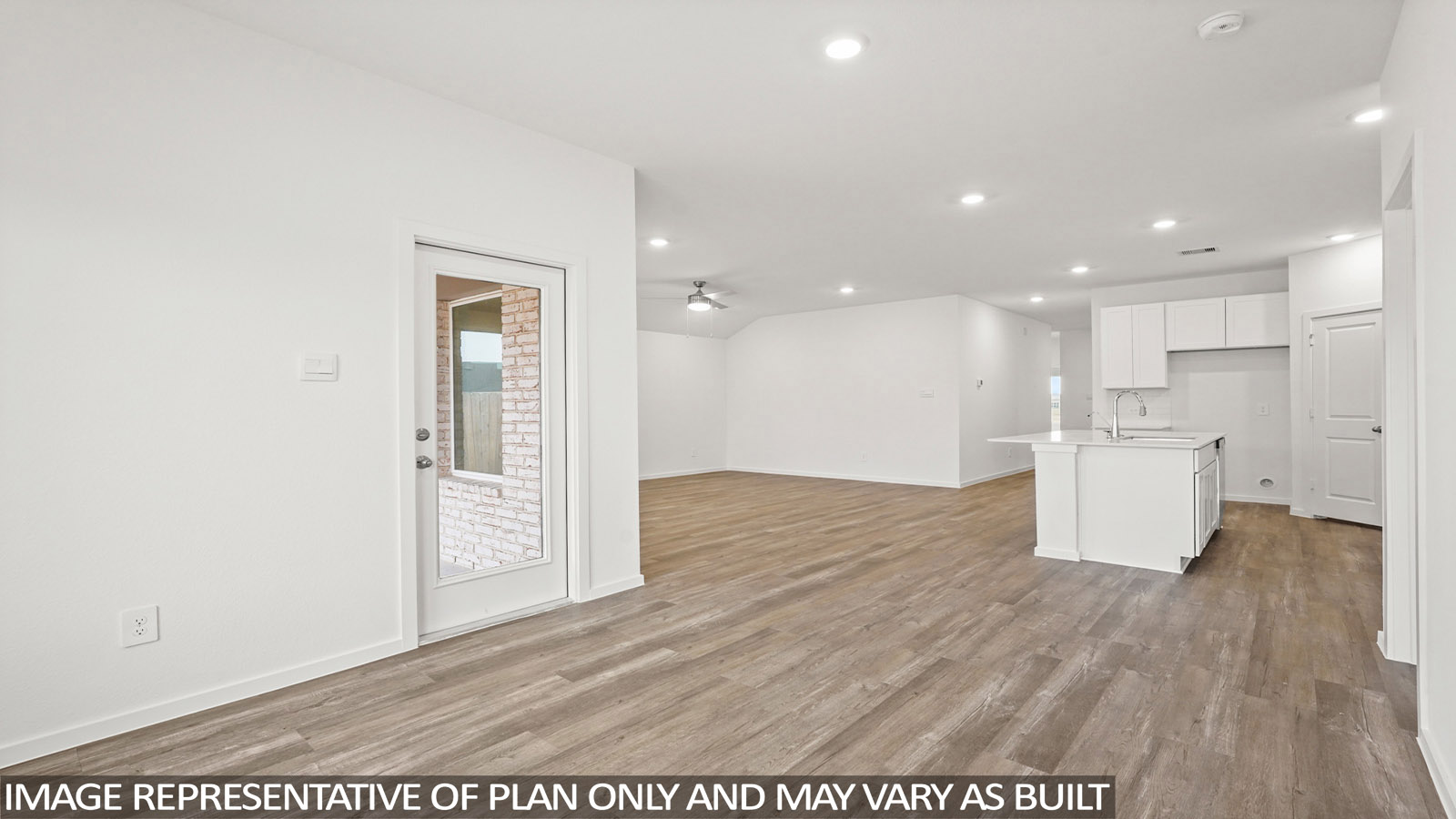 open concept living room with vinyl flooring, quartz countertops, and large windows