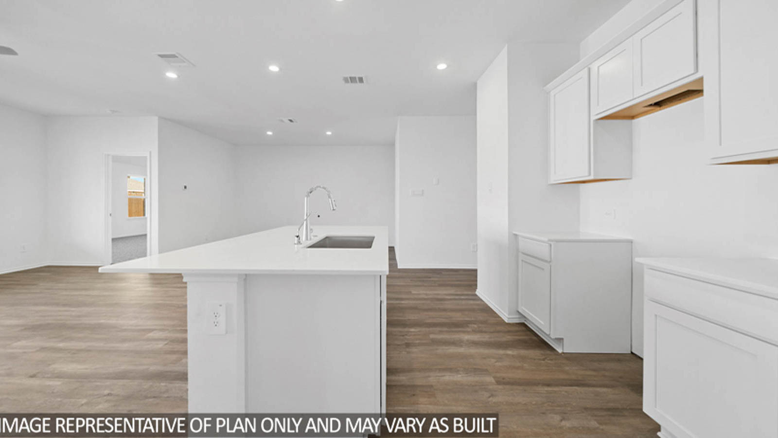 open cncept living and dining area with vinyl flooring, large windows, and quartz countertops in Katy, TX