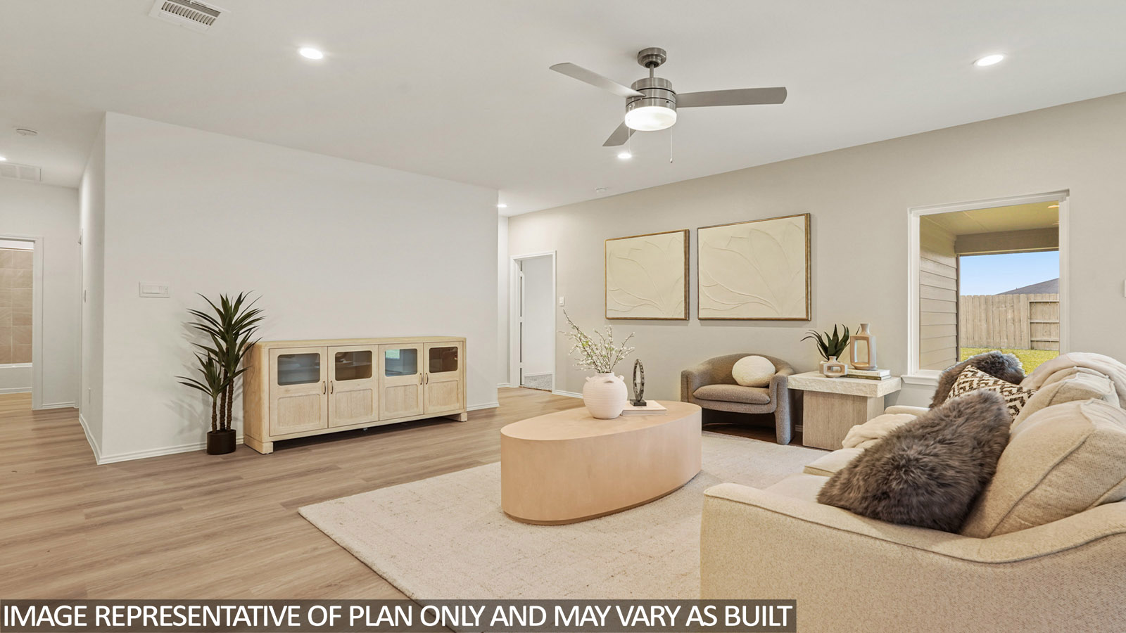 Open concept living, dining, and kitchen area