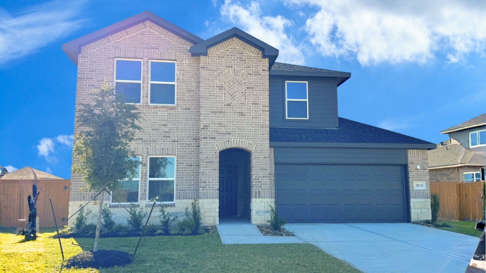 27635 Oasis Ridge Drive, Katy TX, Sunterra By D.R. Horton 2-story, 4-bed, 3-bath, 2-car garage, front yard