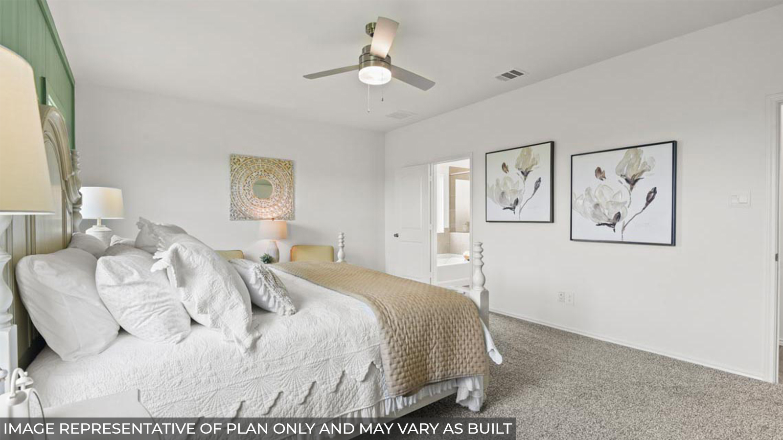 Primary bedroom with carpet flooring