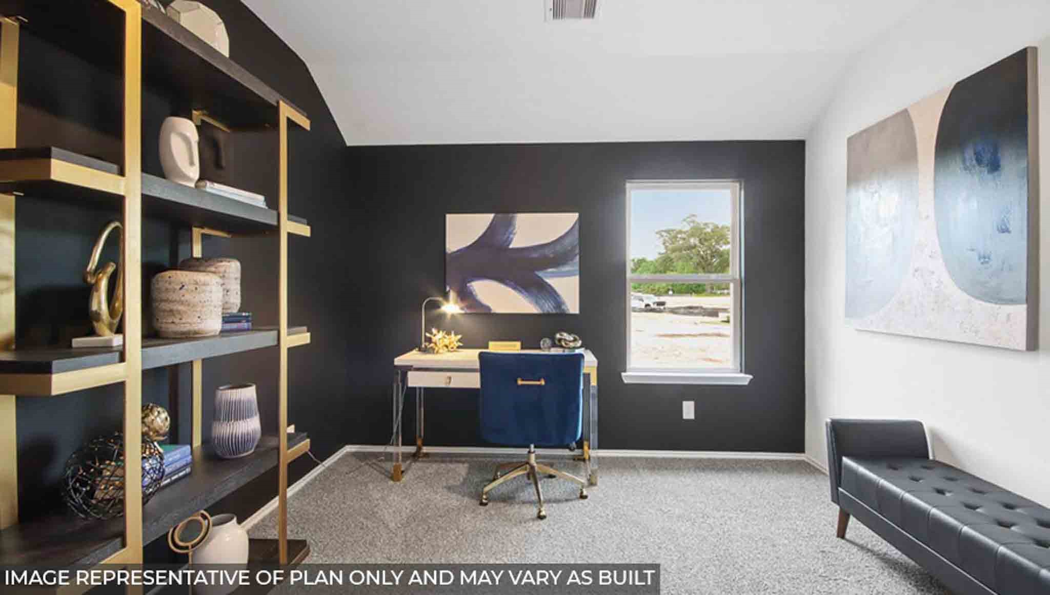 Secondary bedroom with carpet flooring