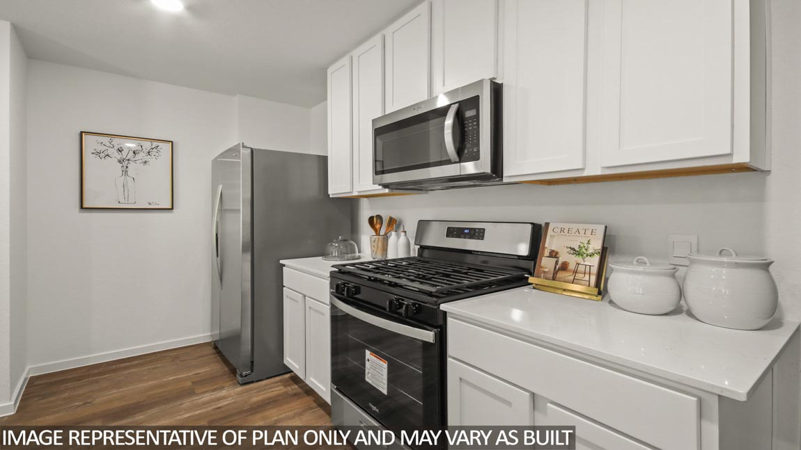 open concept living and dining area with vinyl flooring and quartz countertops