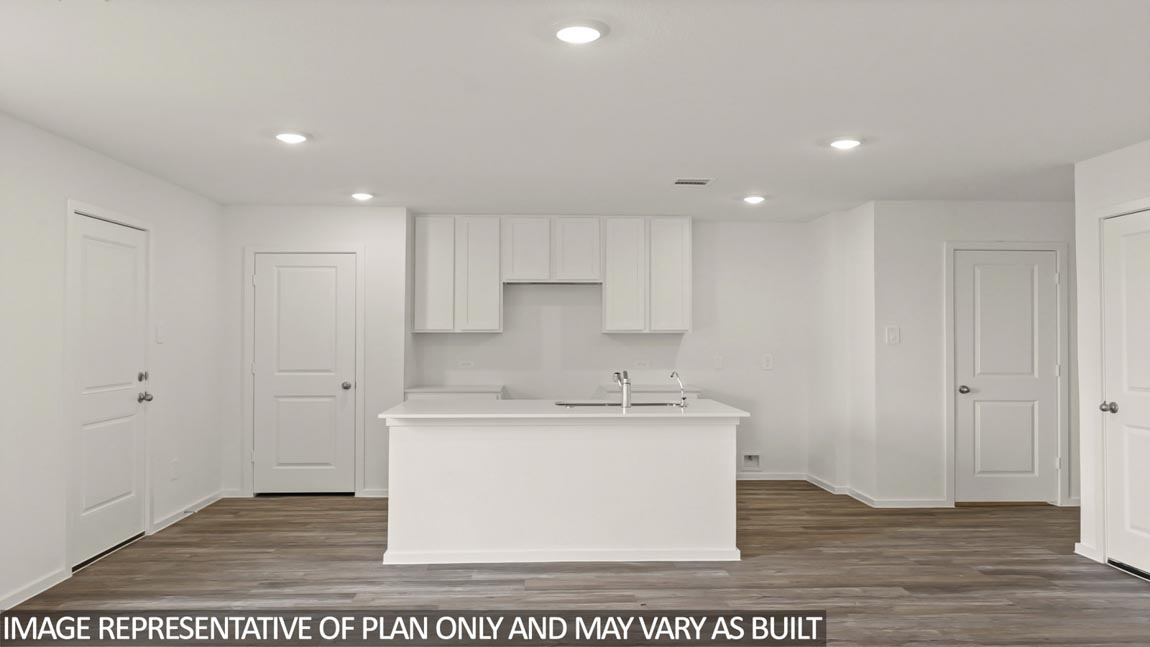 open concept livving and dining area with vinyl flooring, quartz countertops, large windows