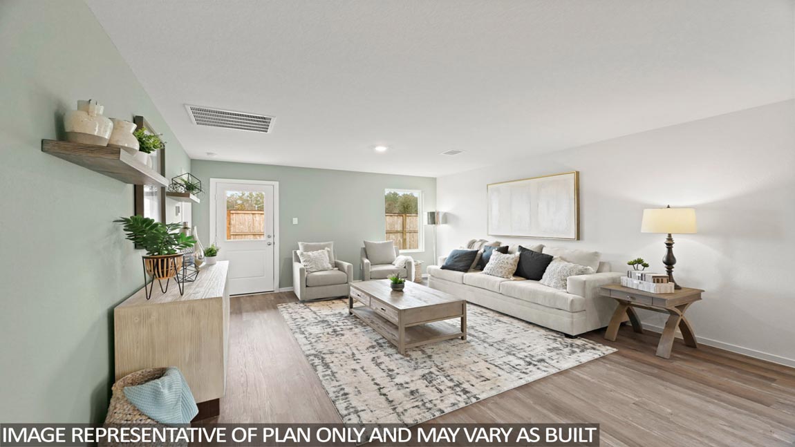 open concept living and dining area with vinyl flooring, quartz countertops, and large windows