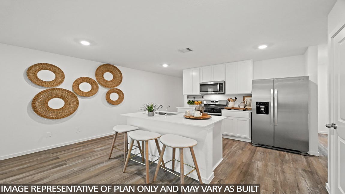 open concept livivng and dining area with vinyl flooring, quartz countertops, and large windows