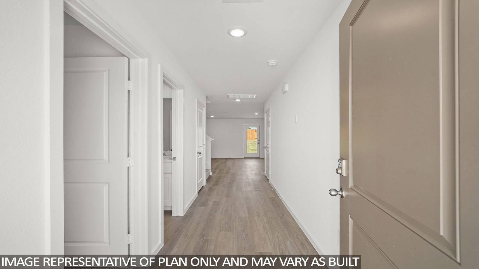 hallway with vinyl flooring