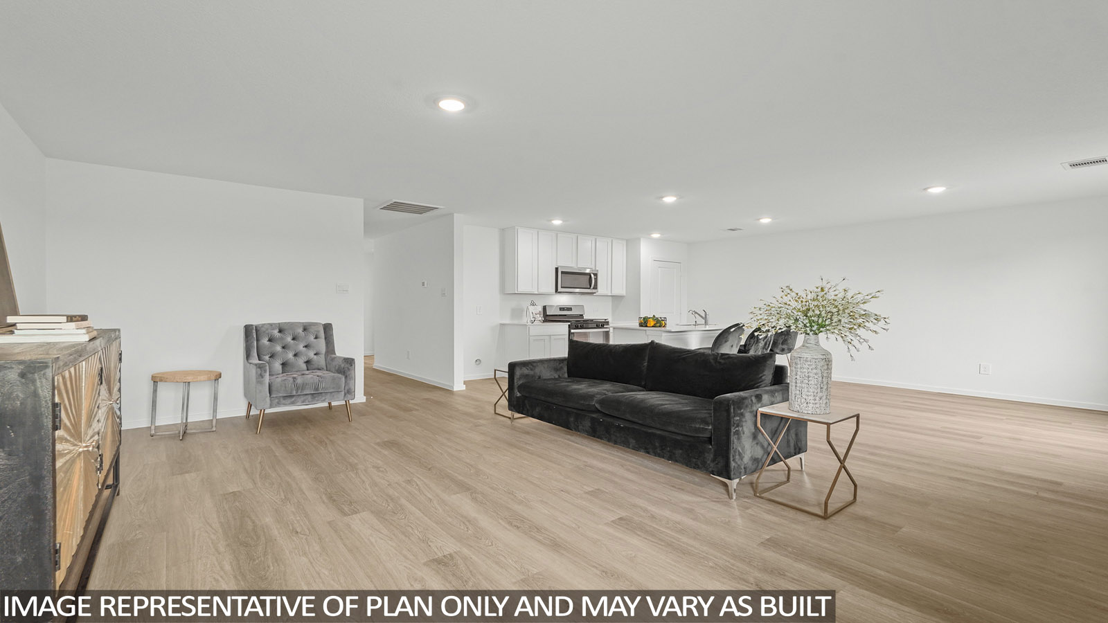 open concept living and dining area with vinyl flooring and large windows