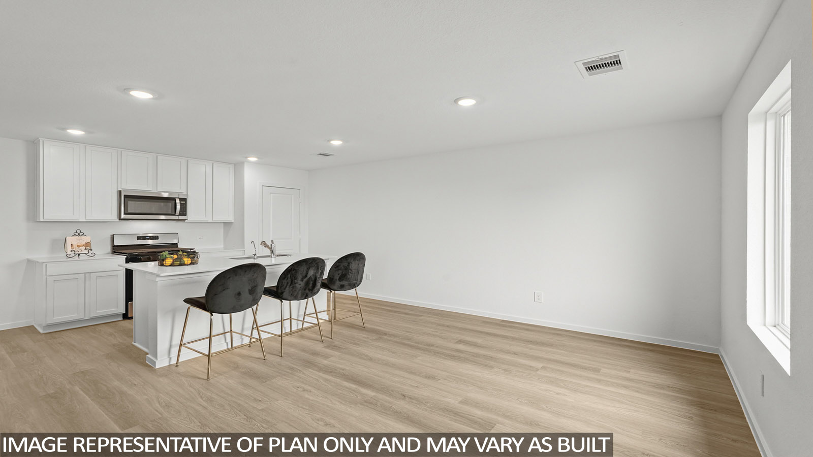 open concept living and dining area with vinyl flooring and large windows