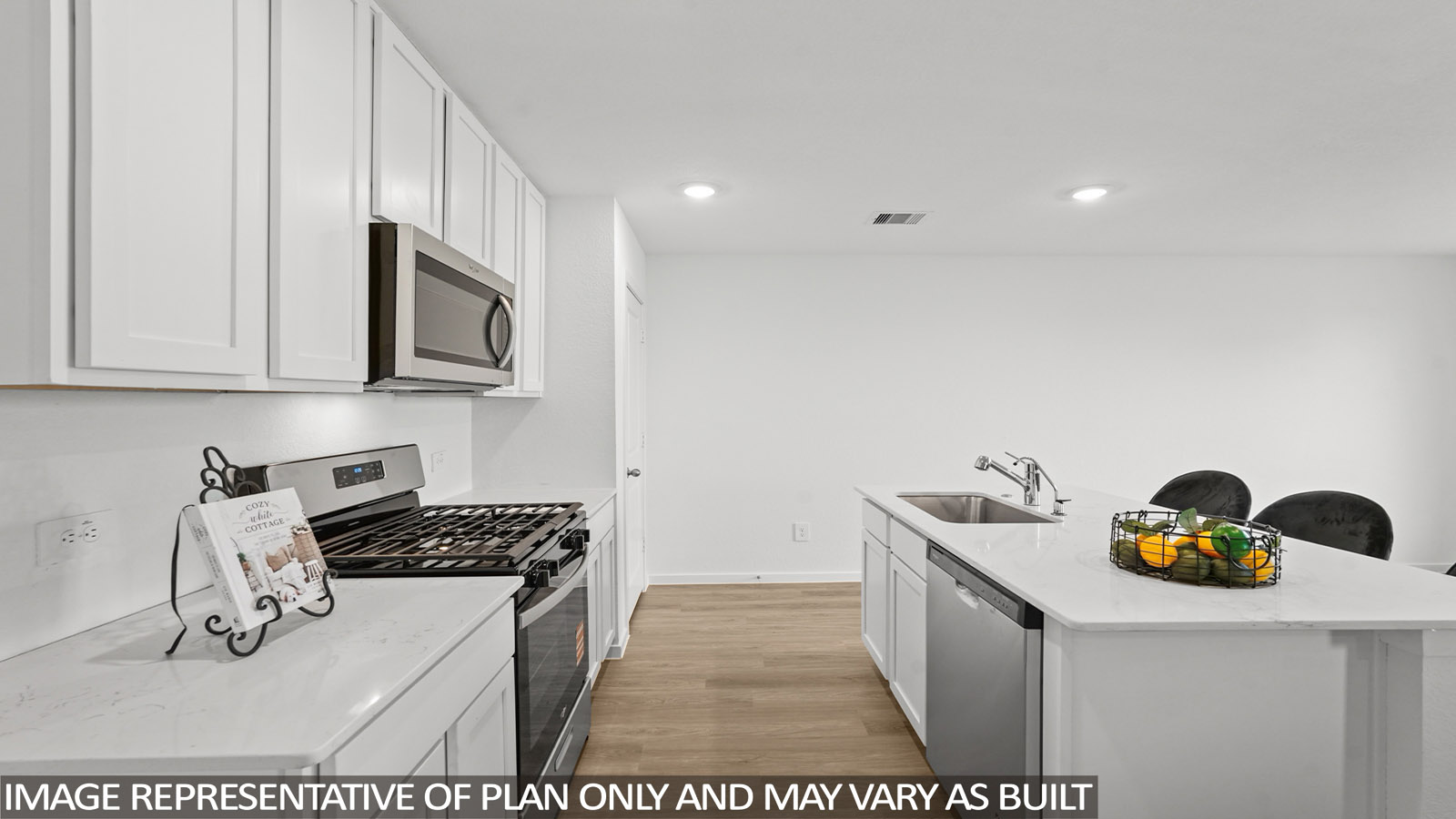 kitchen with quartz countertops and stainless steel appliances
