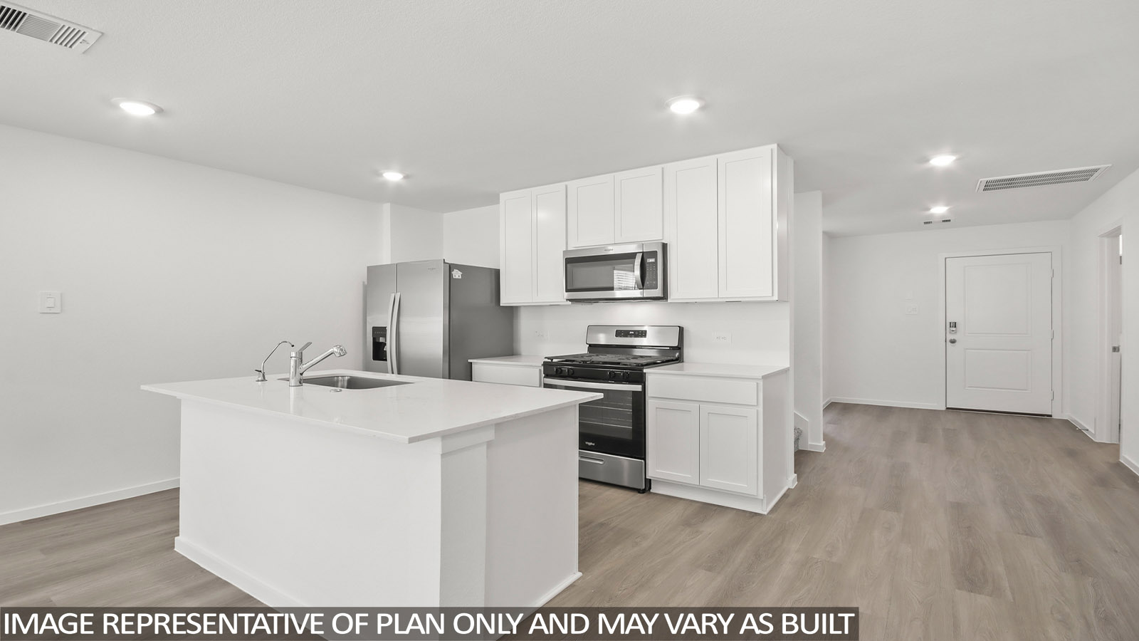 open concept living and dining area with vinyl flooring, large windows, and stainless steel appliances