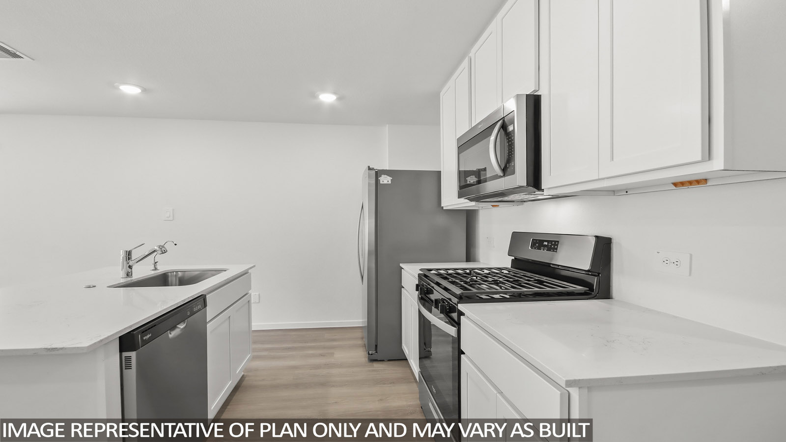 open concept living and dining area with vinyl flooring, large windows, and stainless steel appliances