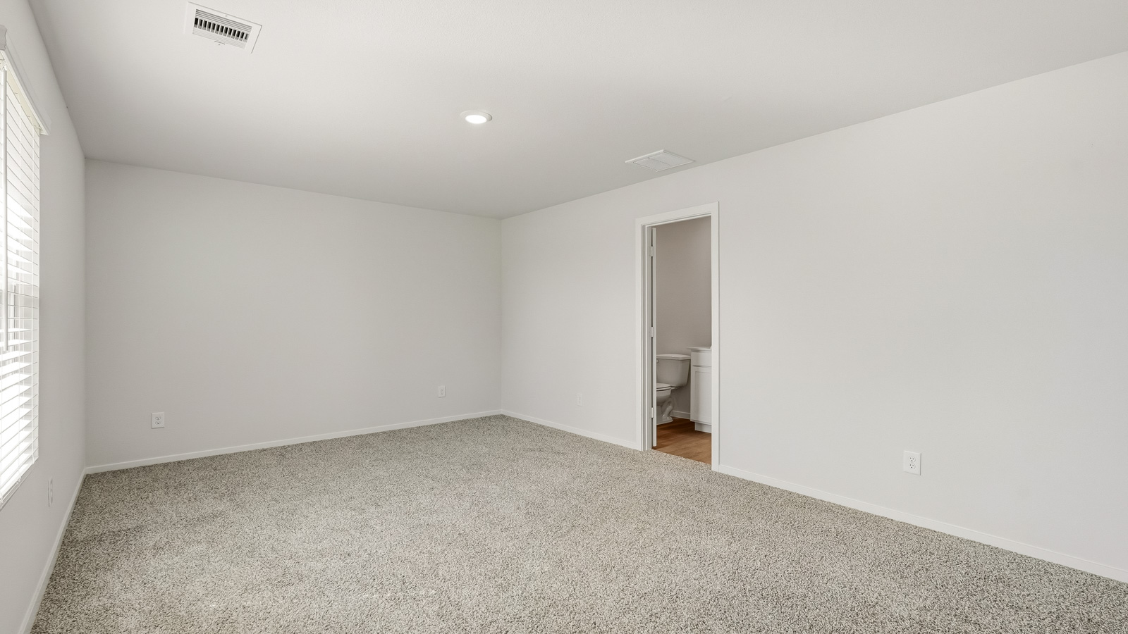 Bedroom with carpet flooring