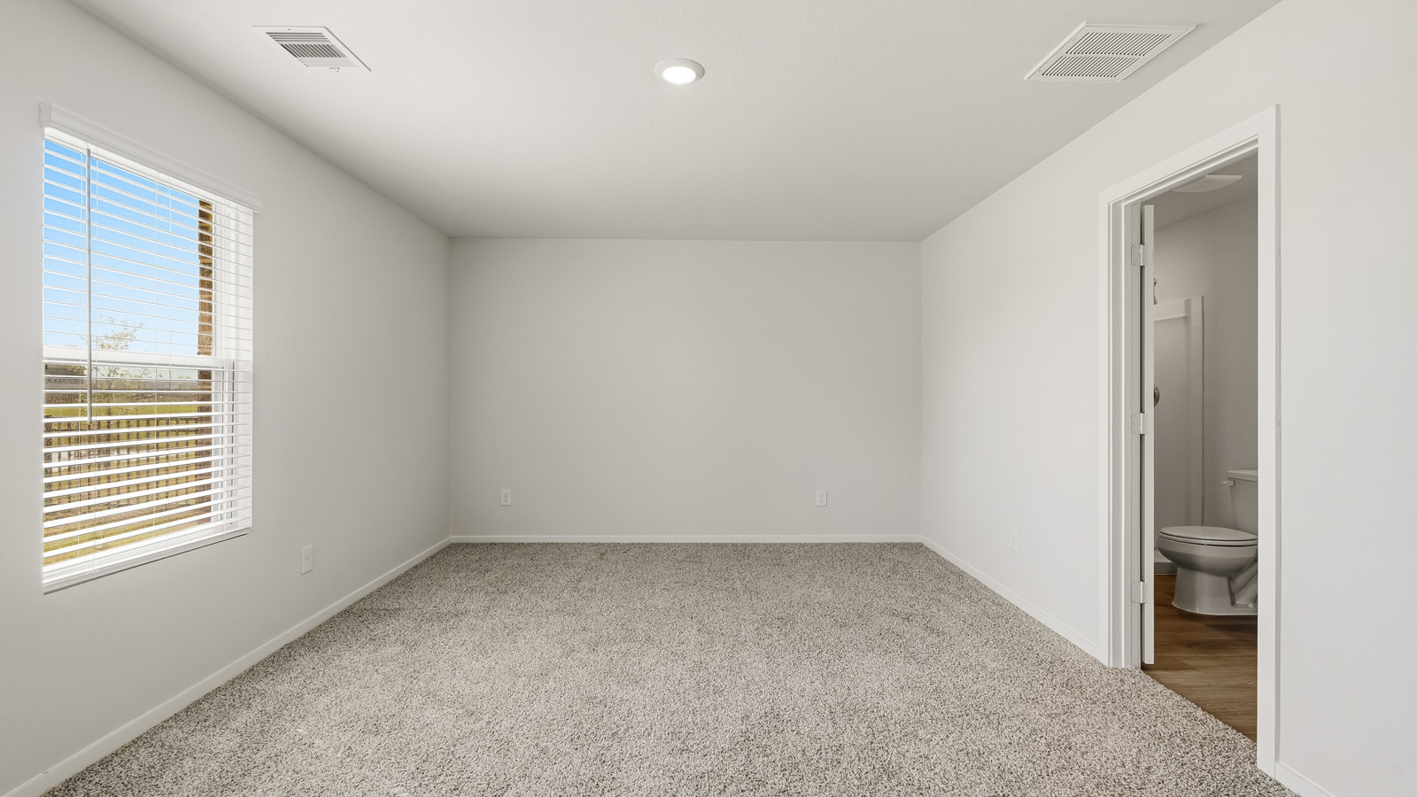 Bedroom with carpet flooring
