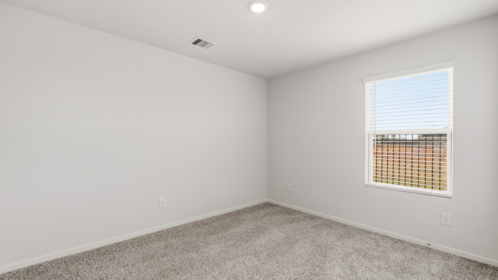 Bedroom with carpet flooring