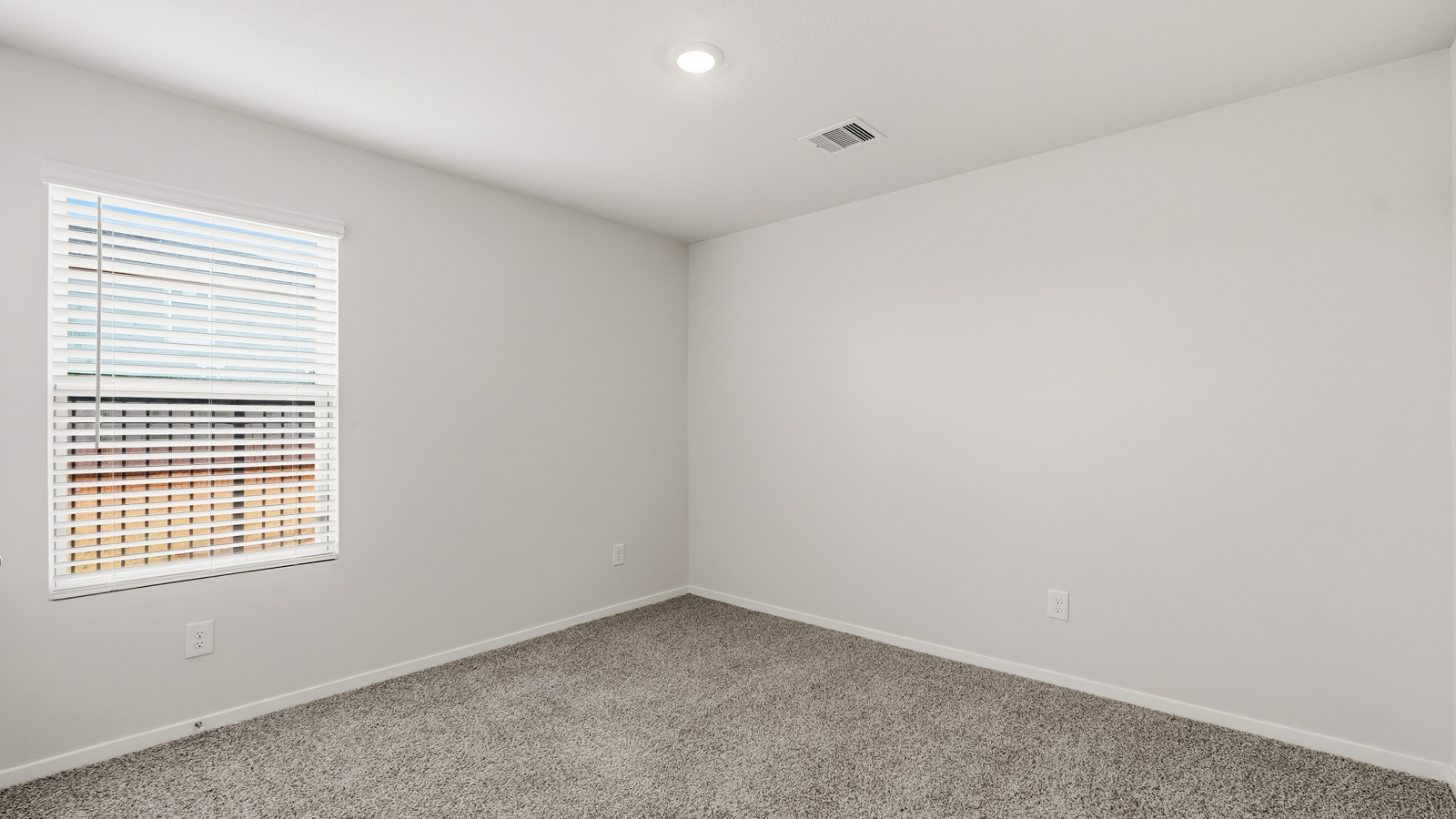 Bedroom with carpet flooring