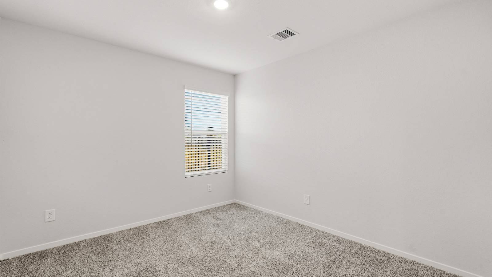 Bedroom with carpet flooring