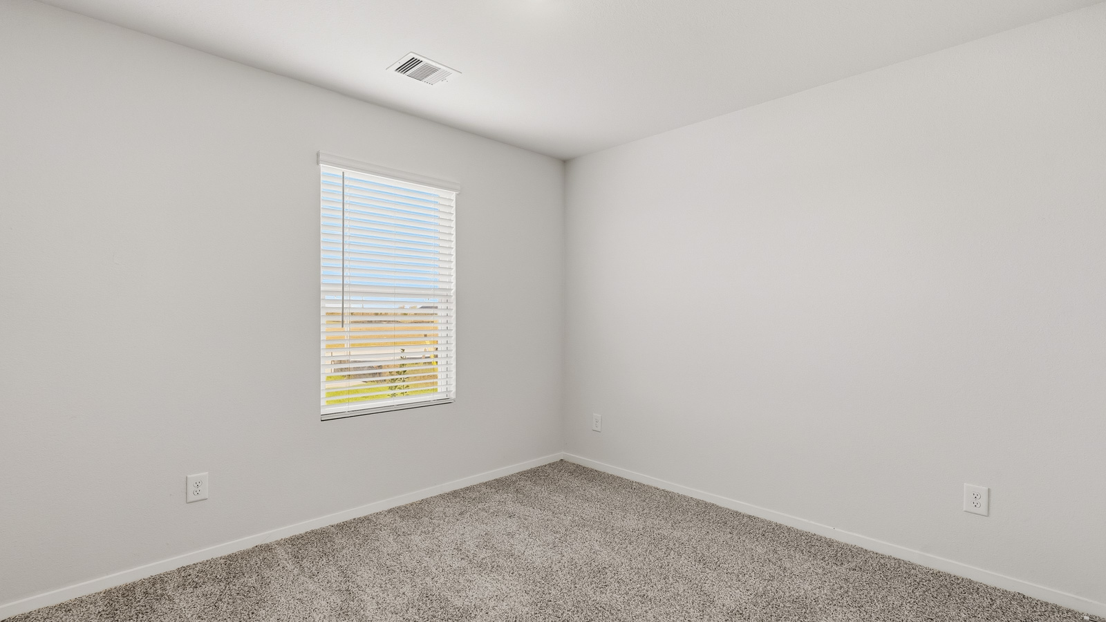 Bedroom with carpet flooring