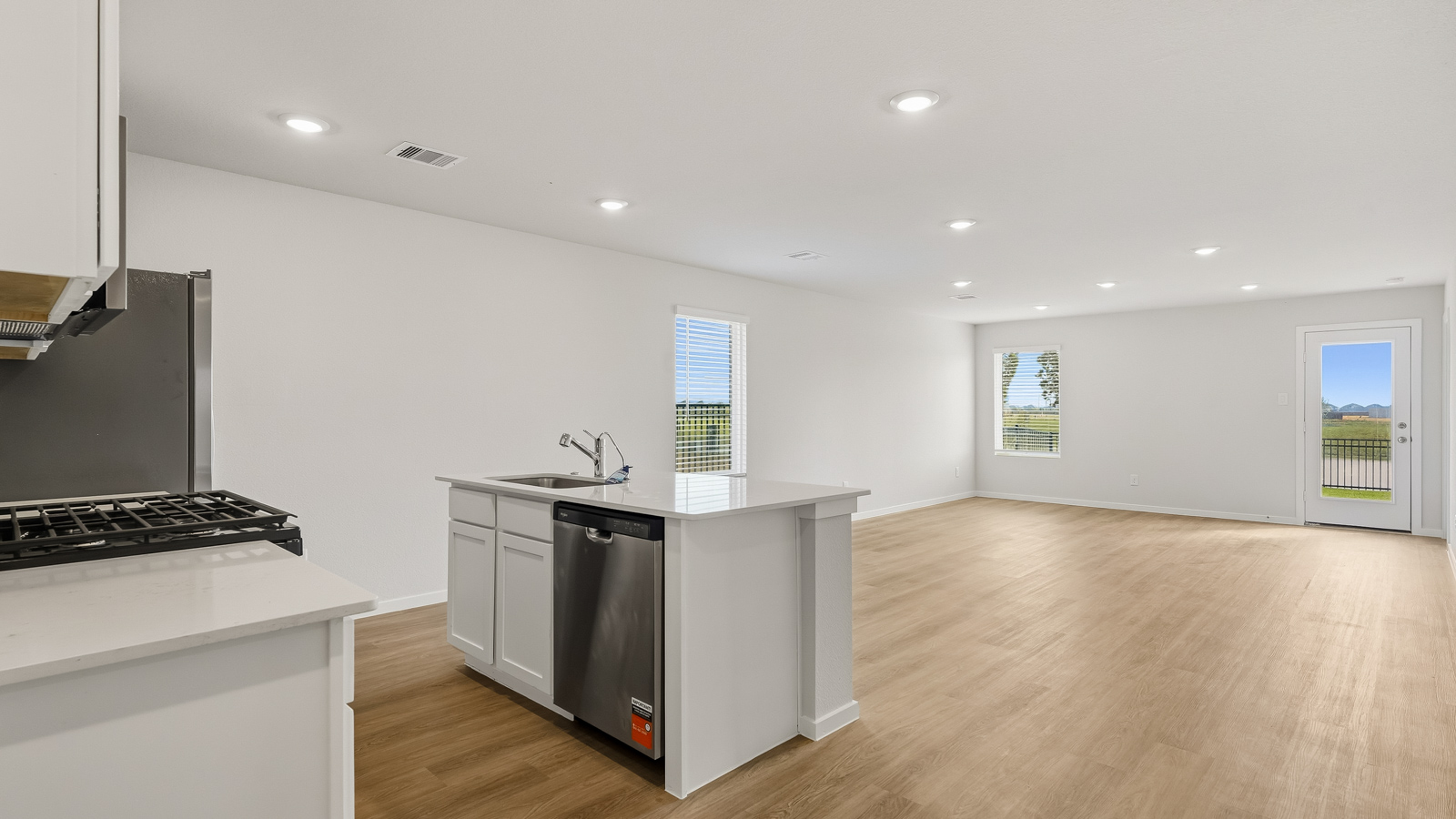 kitchen with quartz countertops and stainless steel appliances