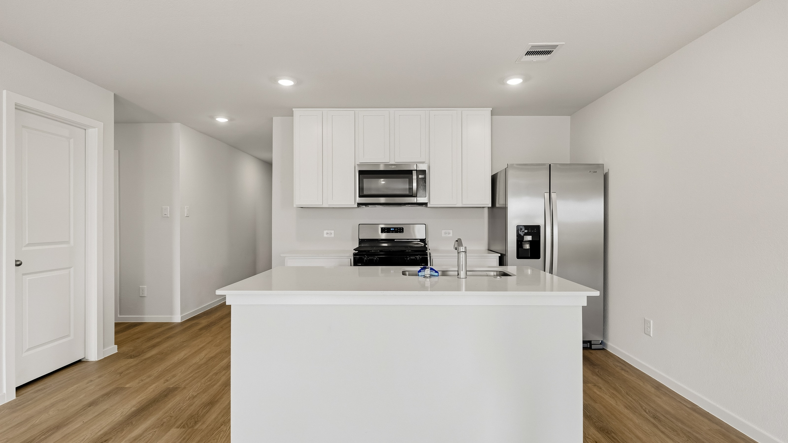 kitchen with quartz countertops and stainless steel appliances