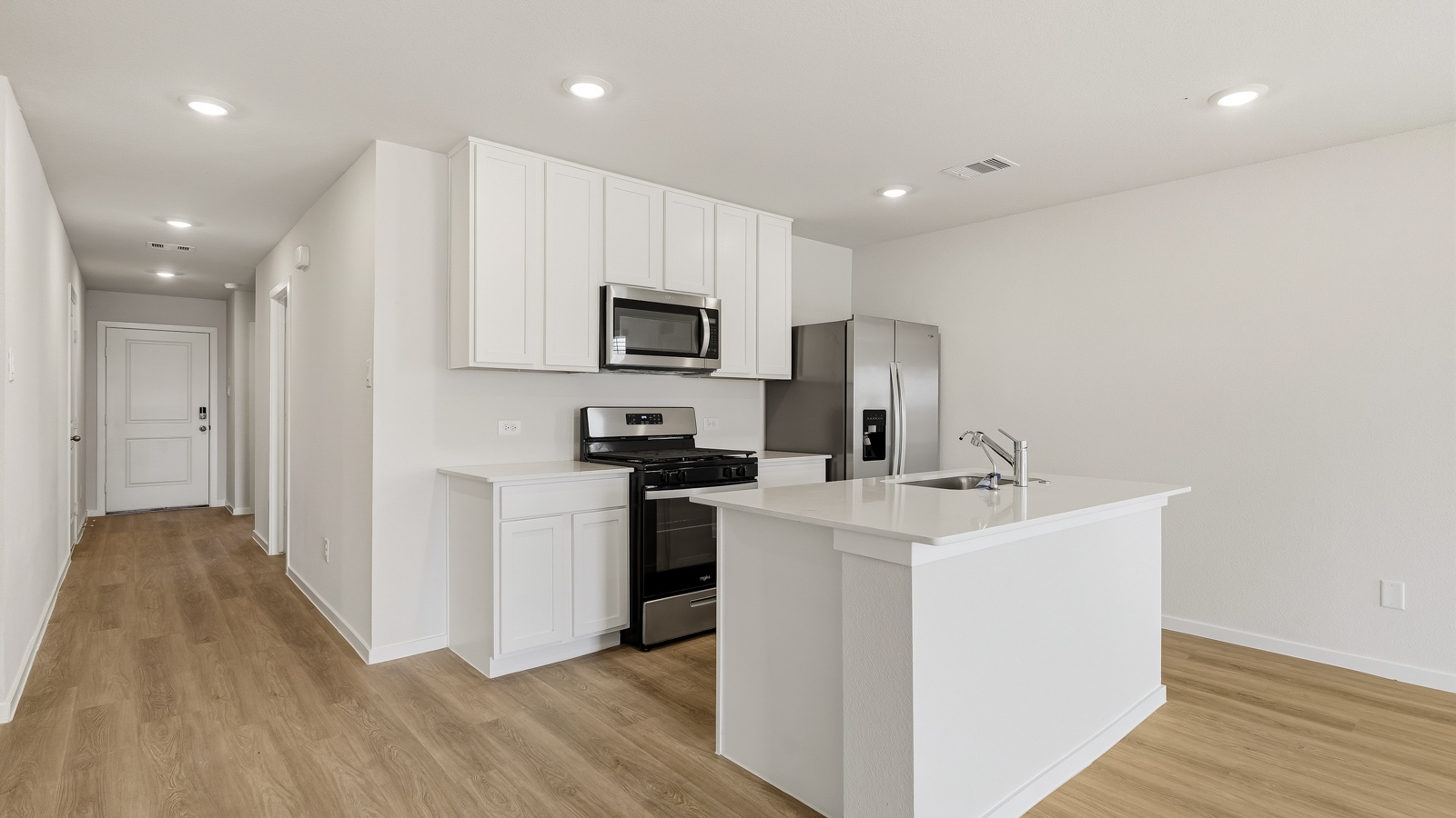 kitchen with quartz countertops and stainless steel appliances