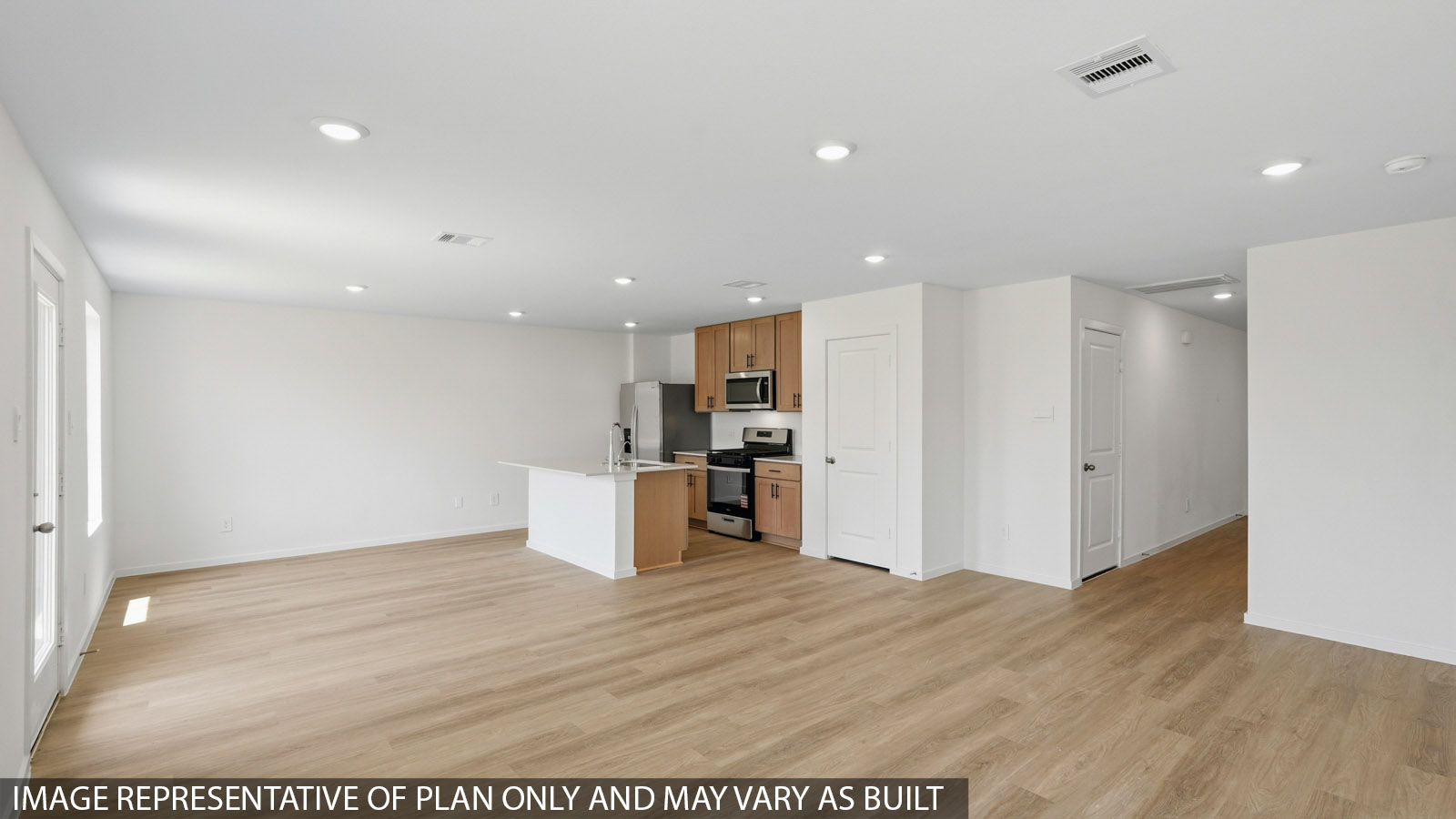 open concept living and dining area with vinyl flooring and large windows