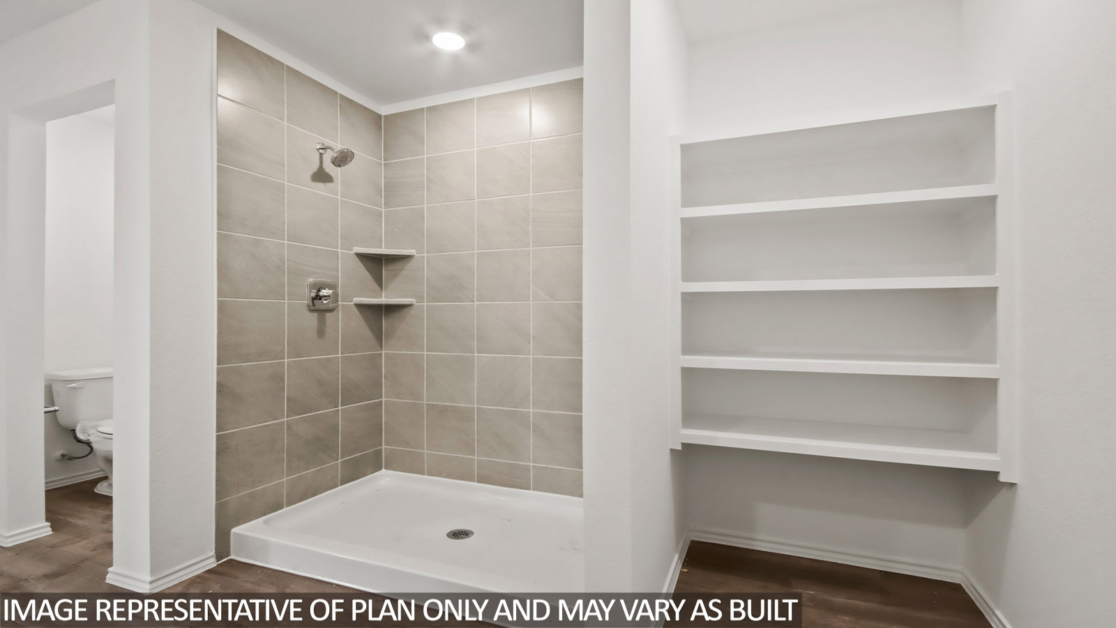 bathroom with built in shelving