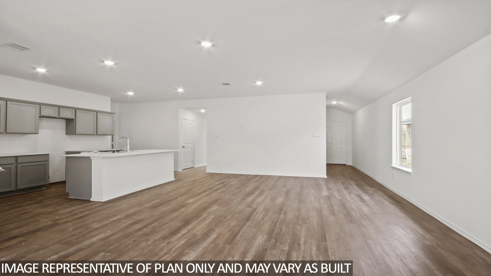 open concept living and dining area with vinyl flooring, stainless steel appliances, and quartz countertops