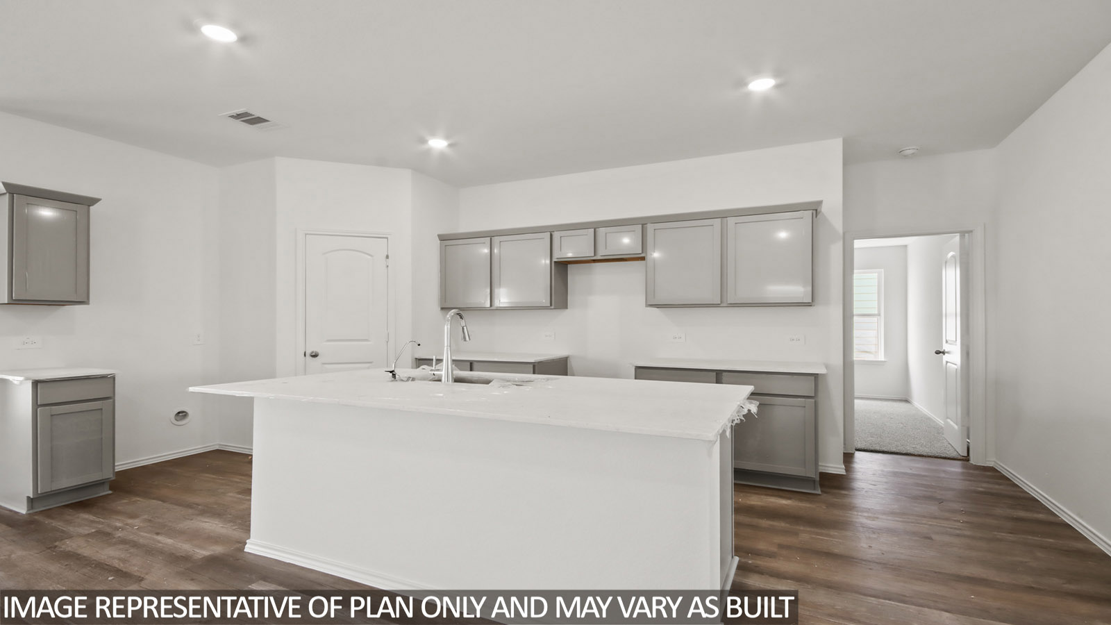 open concept living and dining area with vinyl flooring, stainless steel appliances, and quartz countertops