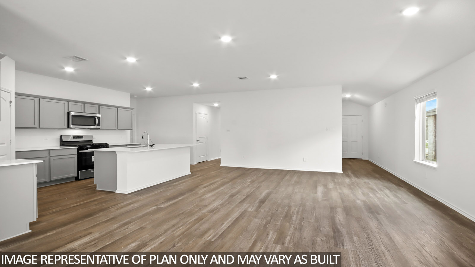 open concept livingand dining area with vinyl flooring and large windows