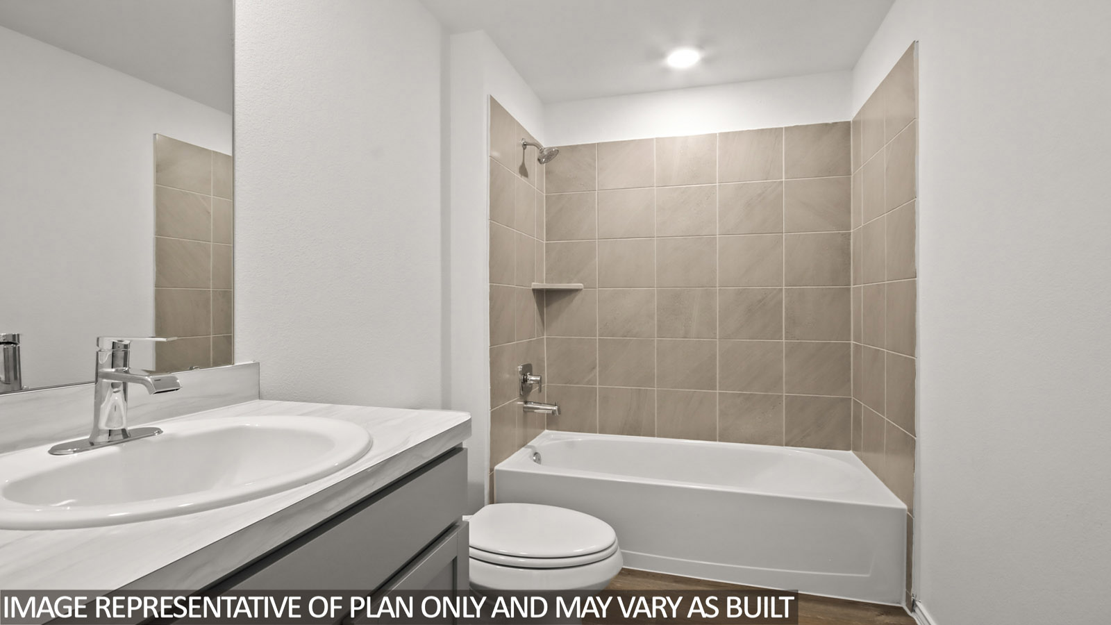 primary bathroom with dual vanity sinks