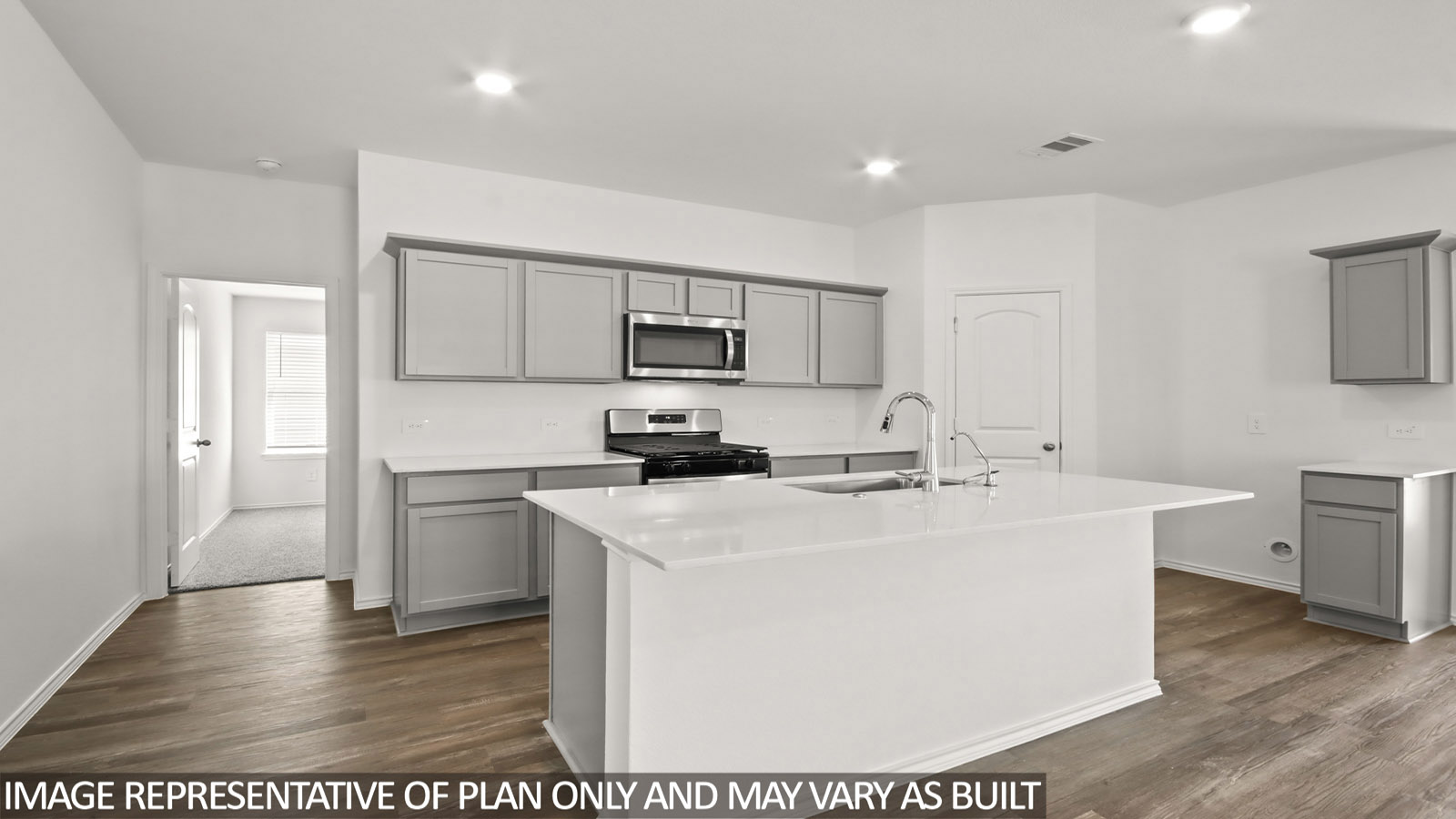 open concept living and dining area with vinyl flooring, large windows, and quartz countertops