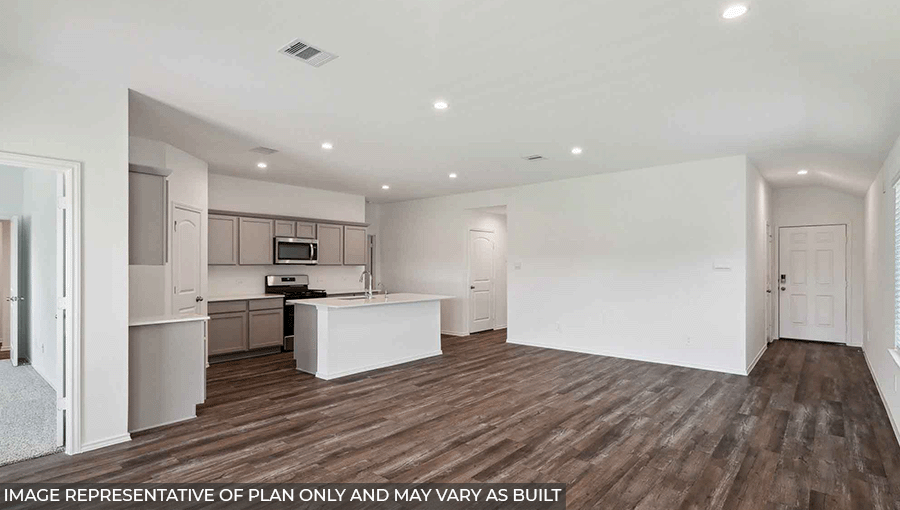 open concept living and dining area with vinyl flooring, large windows and quartz countertops in Magnolia, TX