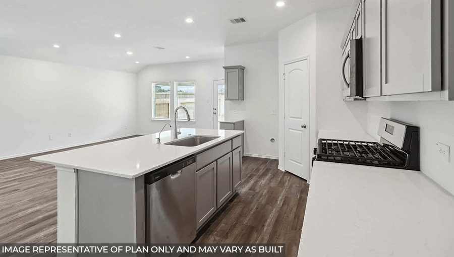 open concept living and dining area with vinyl flooring, large windows and quartz countertops in Magnolia, TX