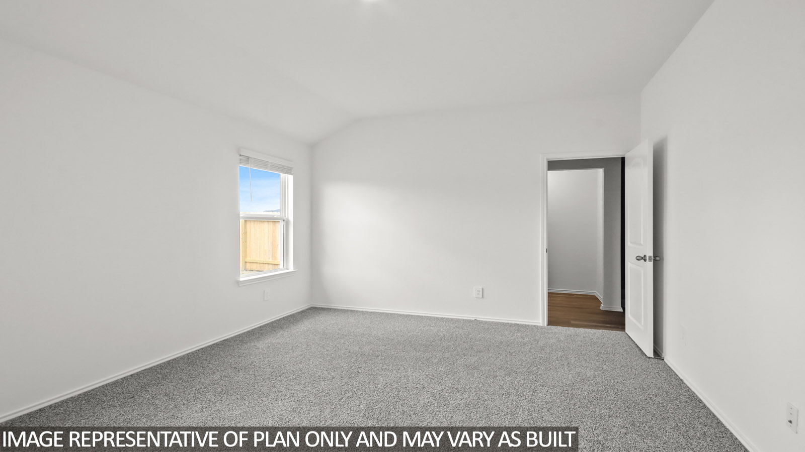 bedroom with carpet flooring and window in Magnolia, TX