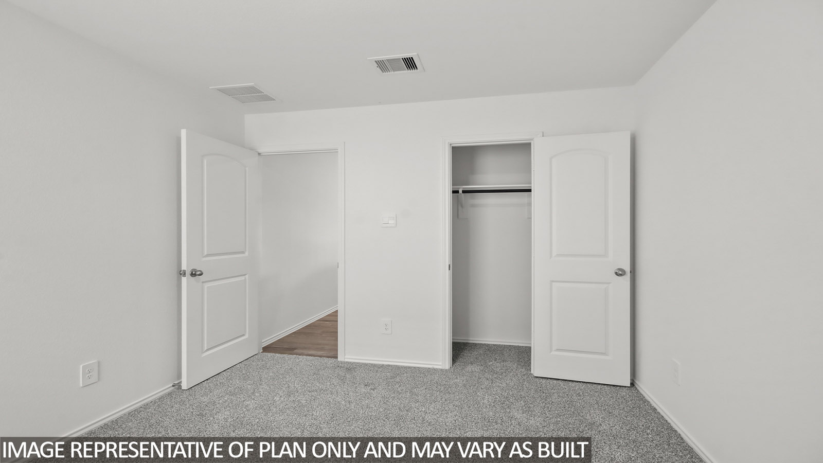 .bedroom with carpet flooring and window in Magnolia, TX