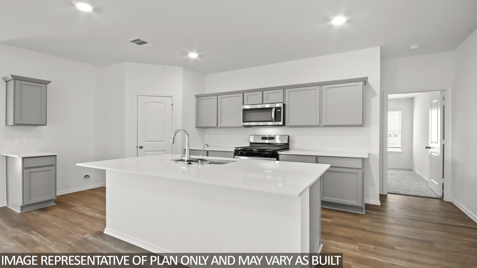 .open concept living and dining area with quartz countertops in Magnolia, TXa