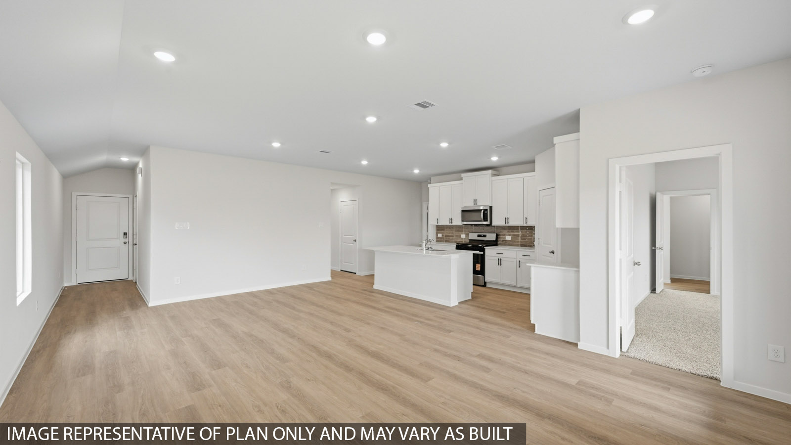open concept living and dining area with vinyl flooring and large windows