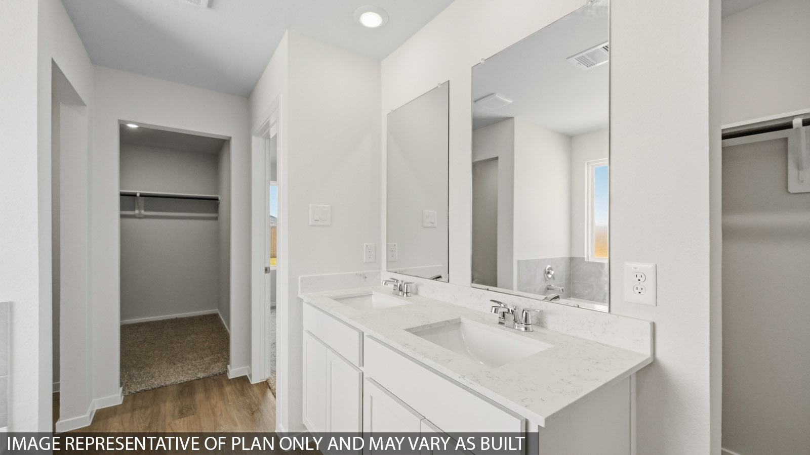 primary bathroom with separate tub and shower