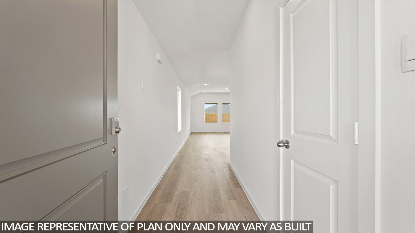 hallway with vinyl flooring
