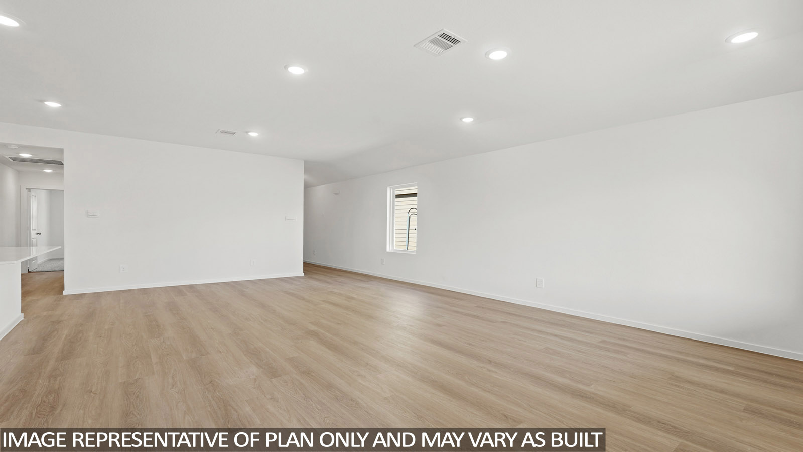 open concept living and dining area with vinyl flooring, large windows, and quartz countertops