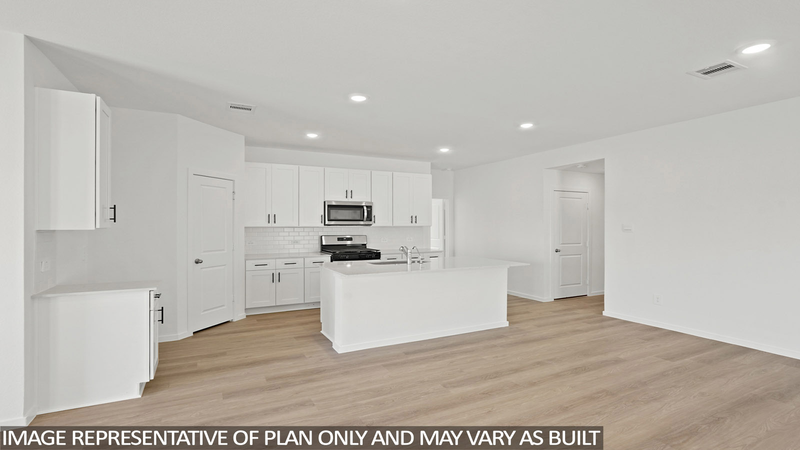 open concept living and dining area with vinyl flooring, large windows, and quartz countertops