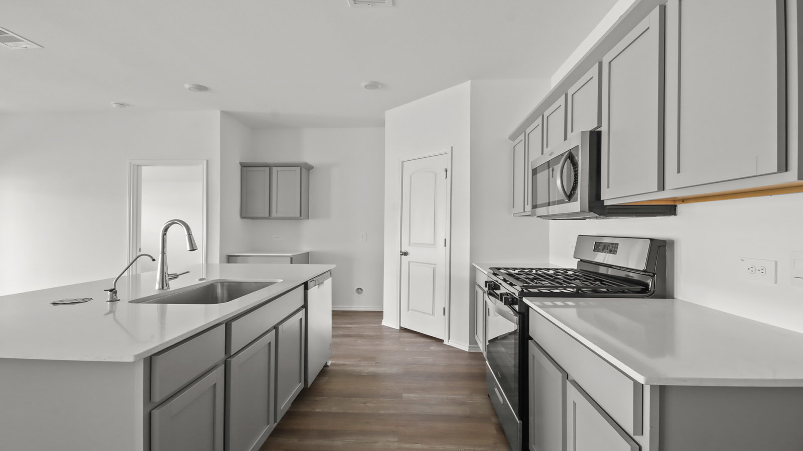 kitchen with quartz countertops and stainless steel appliances