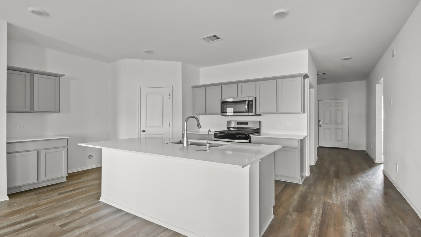 kitchen with quartz countertops and stainless steel appliances