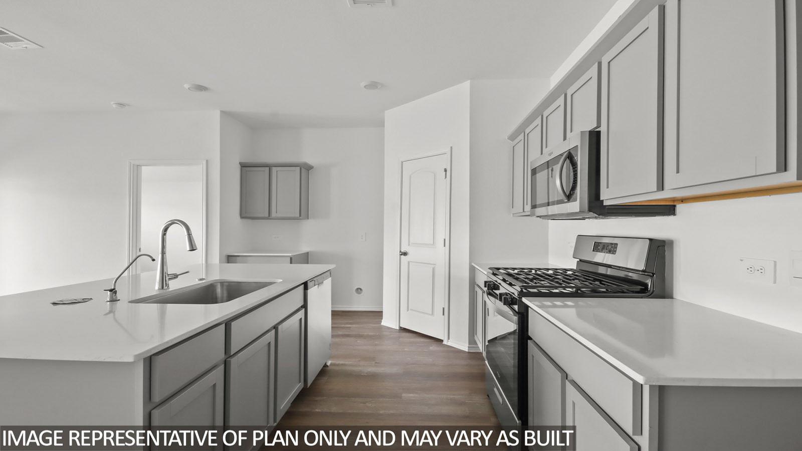 open concept living and dining area with vinyl flooring, quartz countertops, and large windows