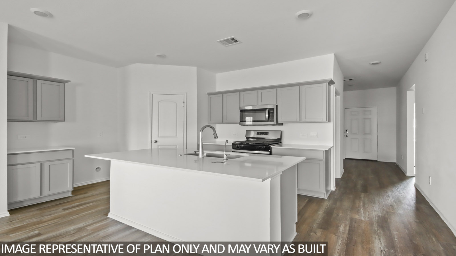 open concept living and dining area with vinyl flooring, quartz countertops, and large windows