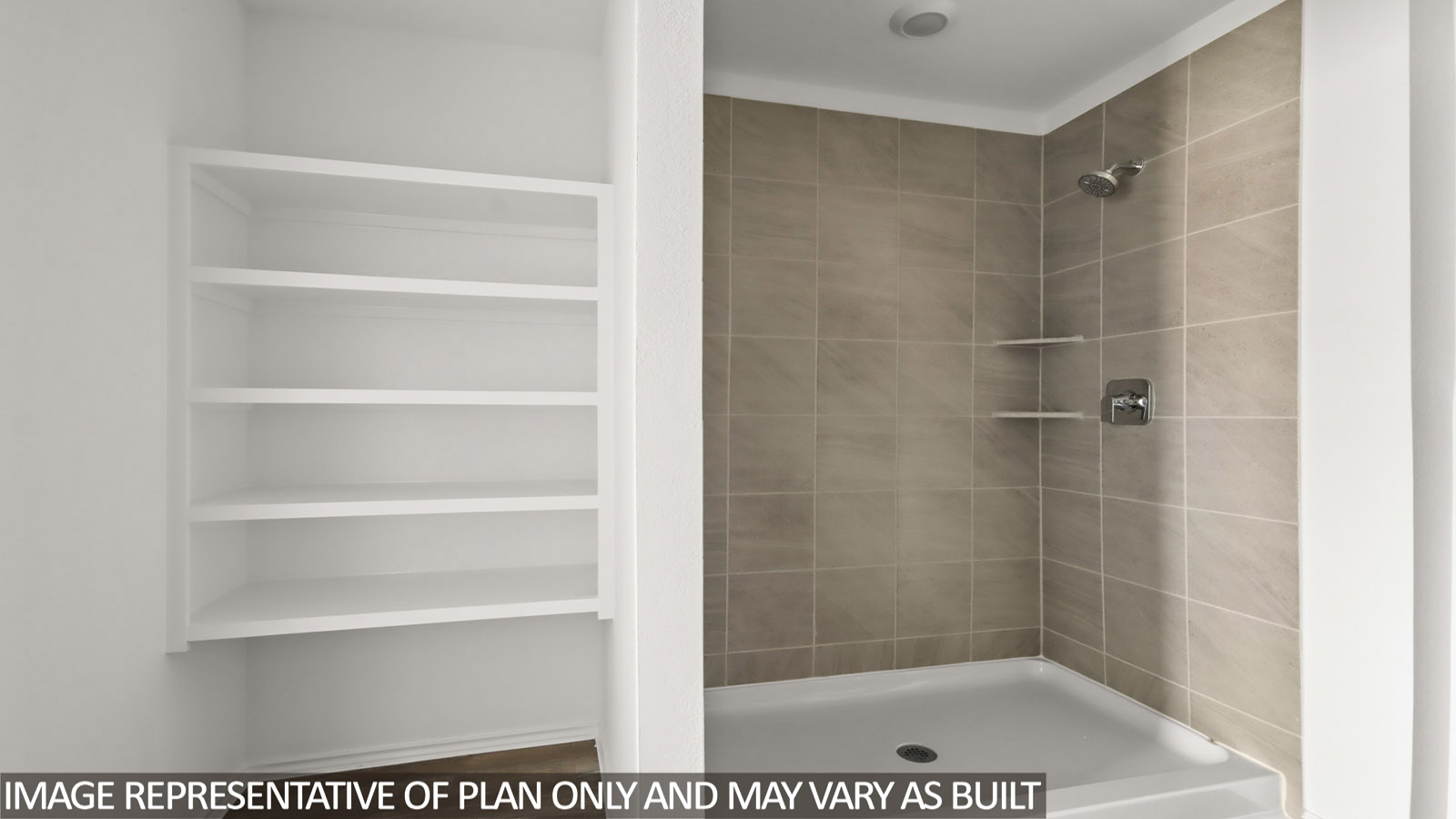 bathroom with stand up shower and built in shelving in Magnolia, TX