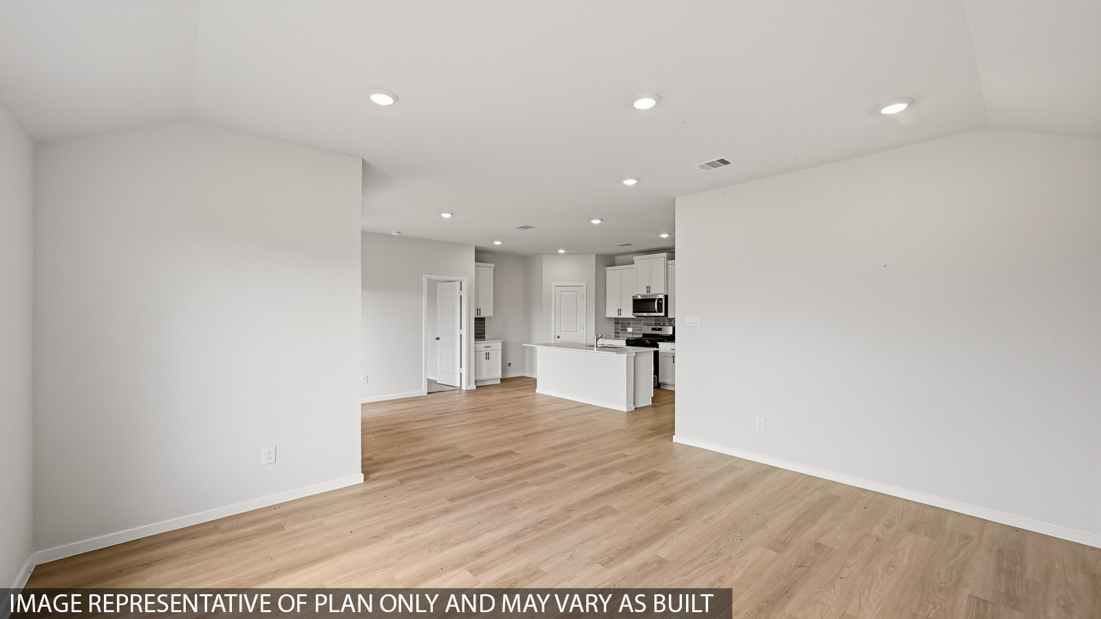 open concept living and dining area with vinyl flooring and large windows